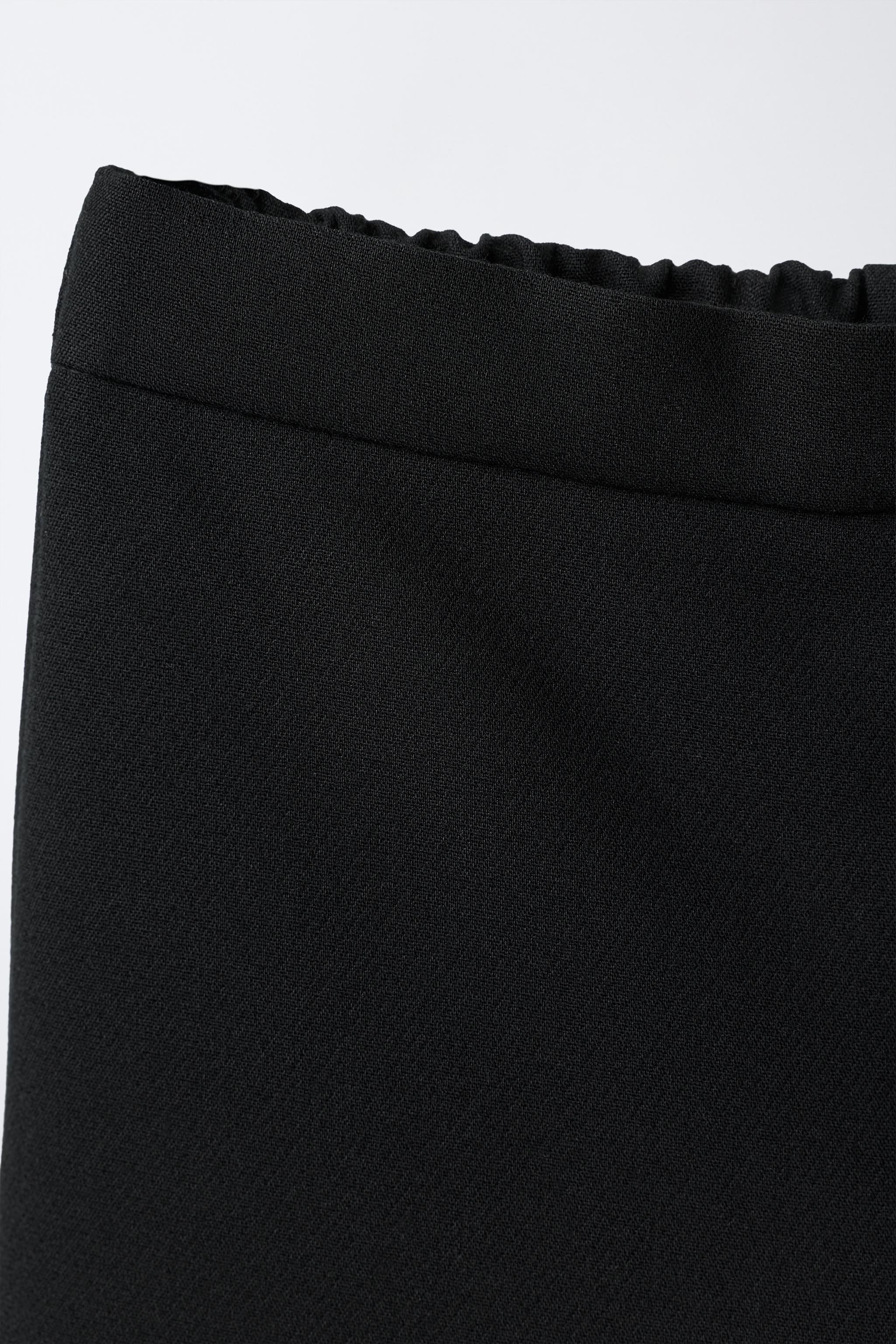 CULOTTE PANTS WITH RUFFLED HEM